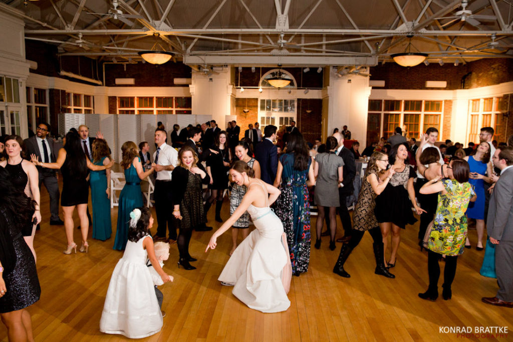 A group of people dancing at a Prospect Park wedding reception.