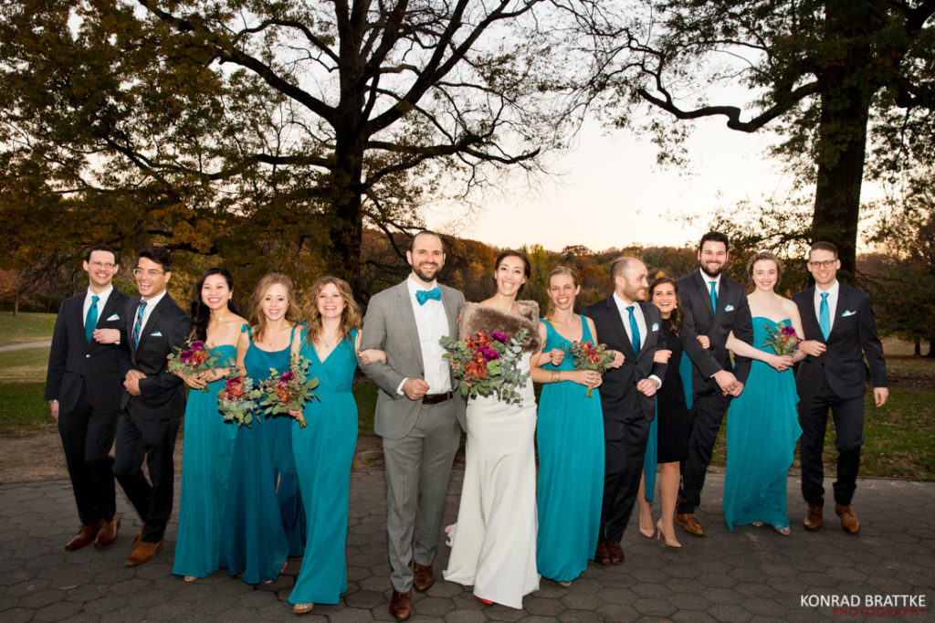 A group of bridesmaids and groomsmen posing for a photo at a Prospect Park wedding.