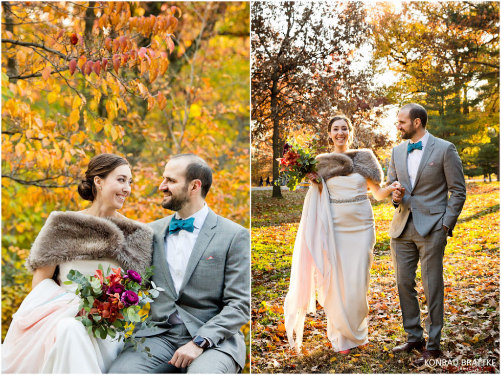 A bride and groom in Prospect Park surrounded by autumn leaves.