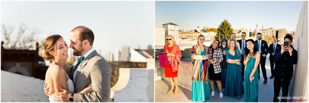 A group of people are posing for a photo on a rooftop at a Prospect Park wedding.