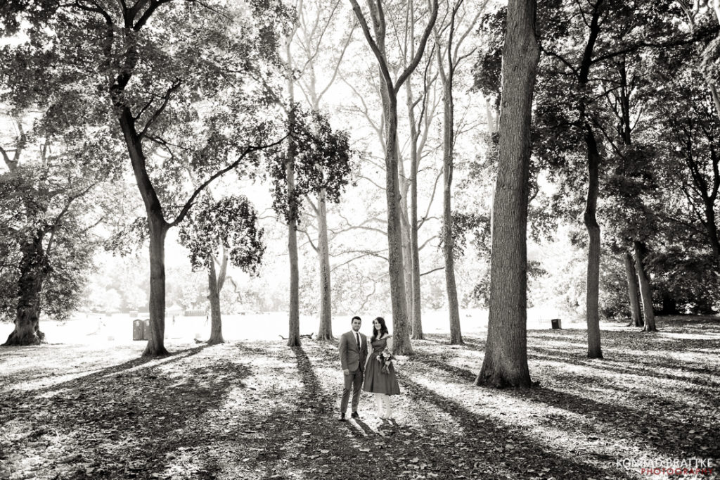 A black and white photo of a couple in Prospect Park.