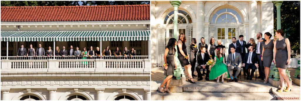 A group of people posing for a picture on a balcony during a Boathouse Wedding in Prospect Park.