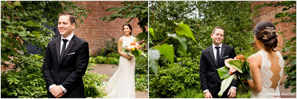 A bride and groom standing in front of the 26 Bridge.