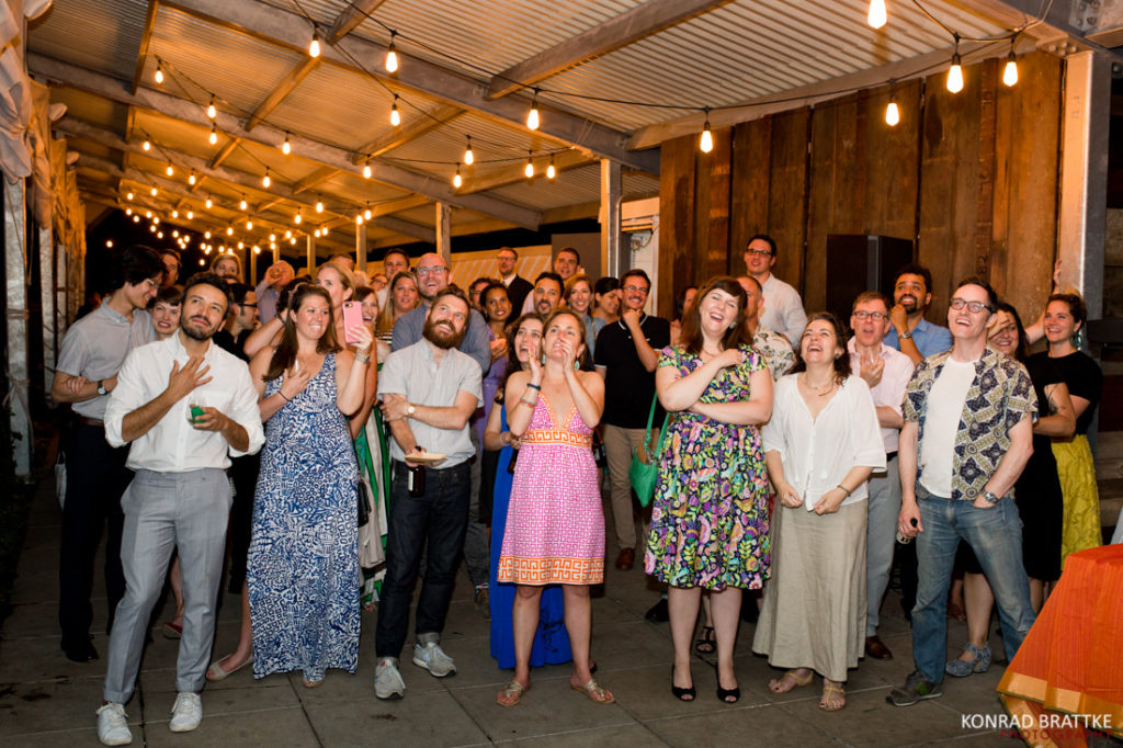 A group of people posing for a photo at a Brooklyn wedding.