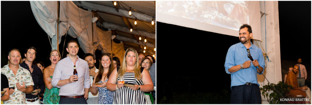 A group of people standing in front of a screen at a Brooklyn Grange Wedding.
