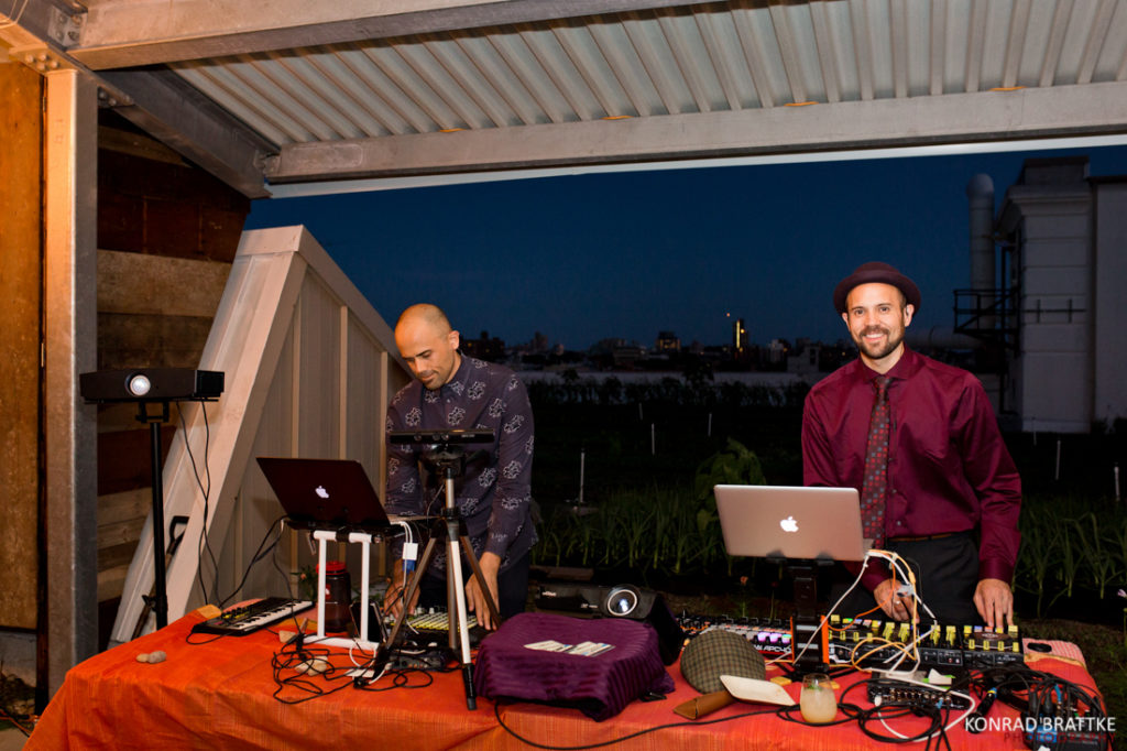 Two Dj's at a Brooklyn Grange Wedding.