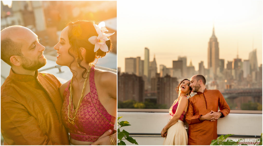 An wedding couple posing on a rooftop with the Brooklyn skyline in the background.