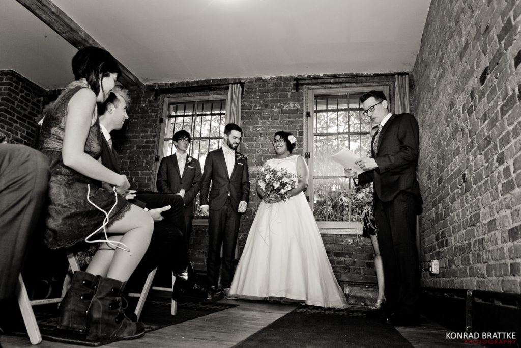 A black and white photo of a Brooklyn wedding ceremony.