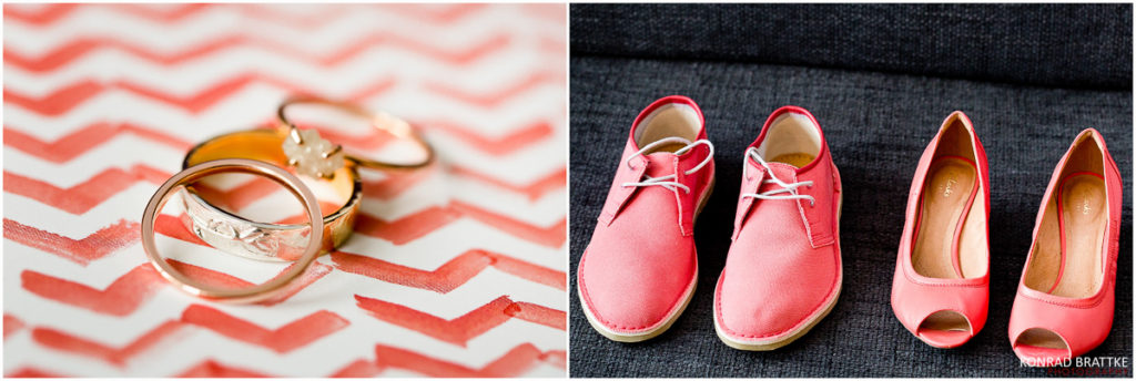 A pair of pink shoes and a wedding ring on a brooklyn chevron pattern.