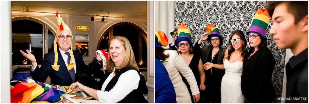 A group of people posing for a photo booth at a Manhattan Penthouse wedding.