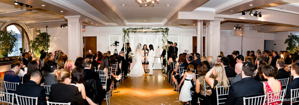 A Manhattan Penthouse wedding in a large room.