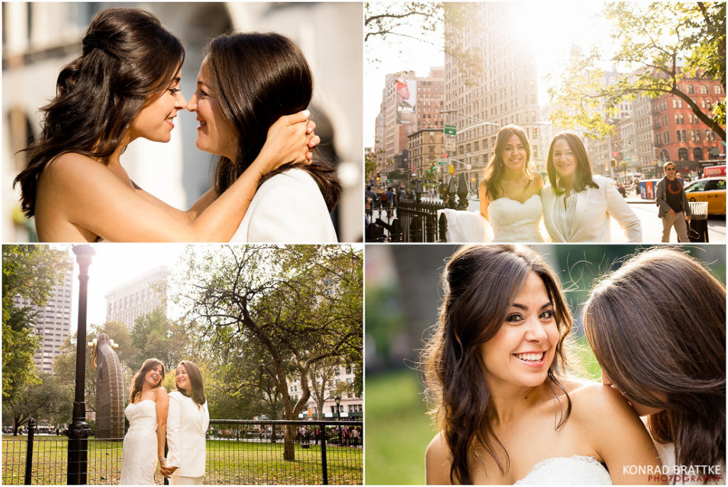 Two women hugging in a park during a Manhattan wedding ceremony.