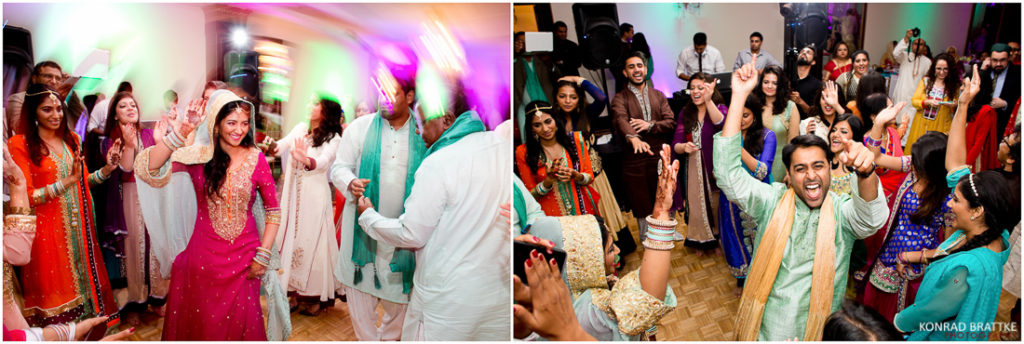 A group of people dancing at a Mehndi ceremony during an Indian wedding at Antuns.