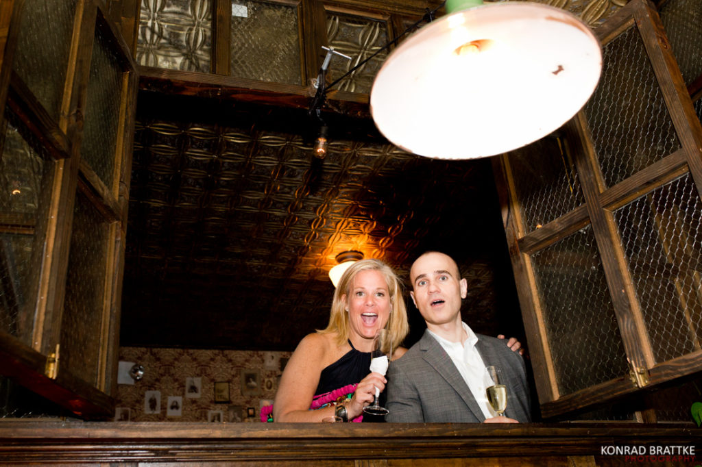 A man and a woman enjoying each other's company at the Brooklyn Winery.