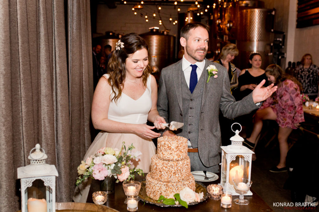 A bride and groom cutting their wedding cake at Brooklyn Winery.