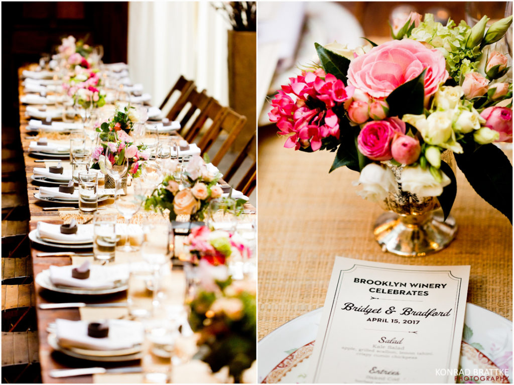 A long table decorated with flowers and set for a luxurious event at the Brooklyn Winery.