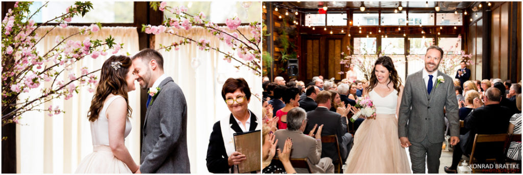 A bride and groom share a romantic kiss during their wedding ceremony at Brooklyn Winery.