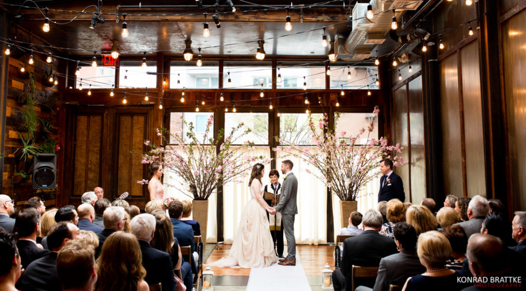 A bride and groom exchange vows at the Brooklyn Winery in a beautiful wedding ceremony.