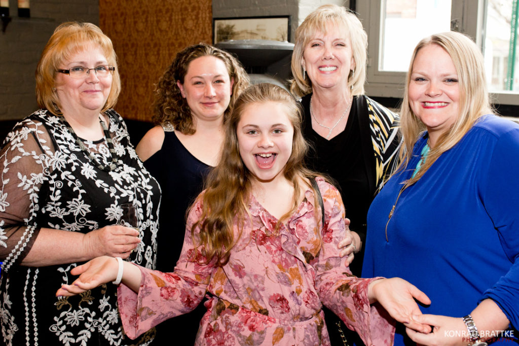 A group of women posing for a picture at Brooklyn Winery.