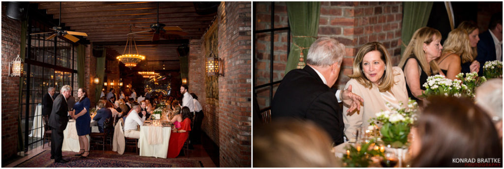 A Bowery Hotel wedding reception at a brick building with people sitting at tables.