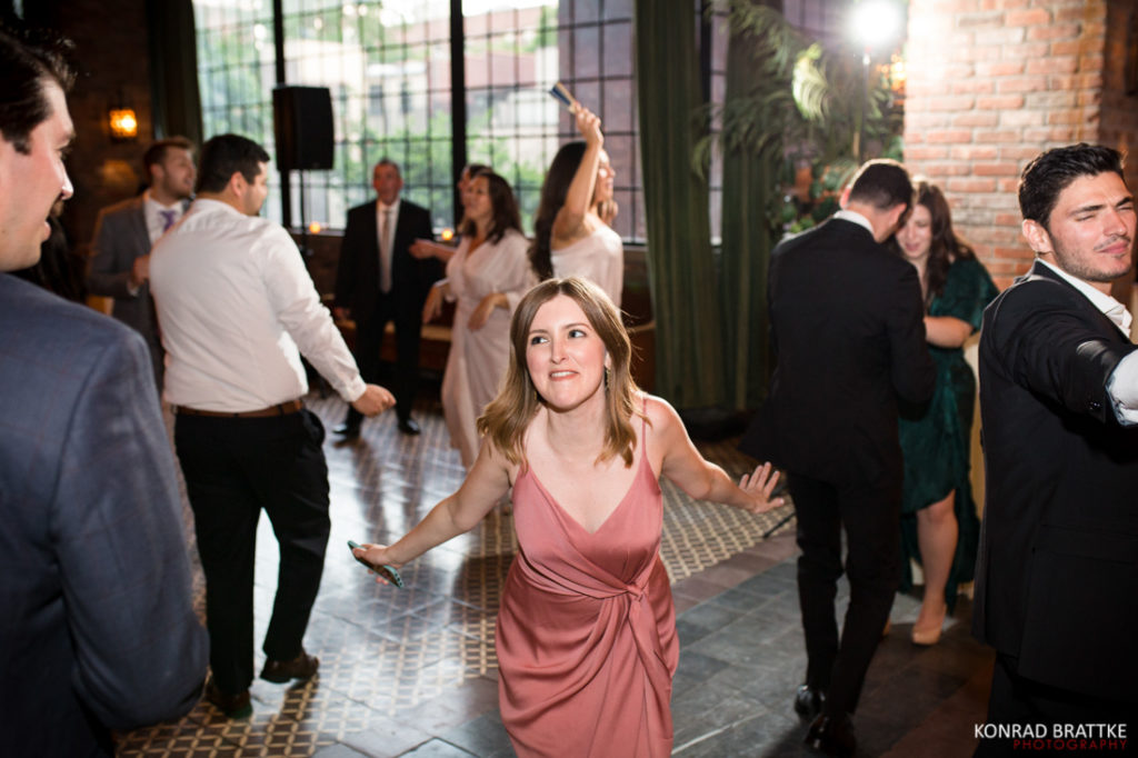 A guest dancing at a Bowery Hotel wedding reception.