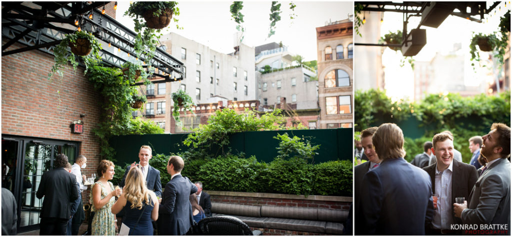 A group of people are standing outside in a courtyard at the Bowery Hotel wedding.