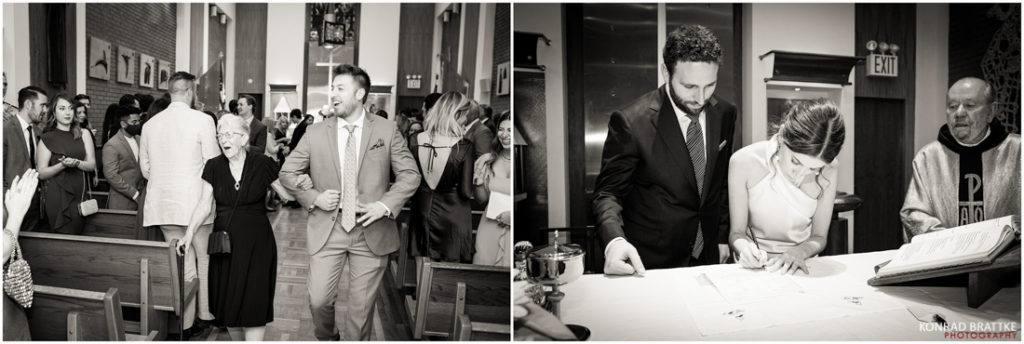 A group of people are standing in front of a table after a wedding.