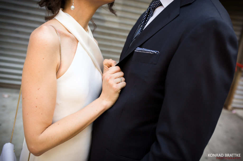 A bride and groom embracing on their wedding day.