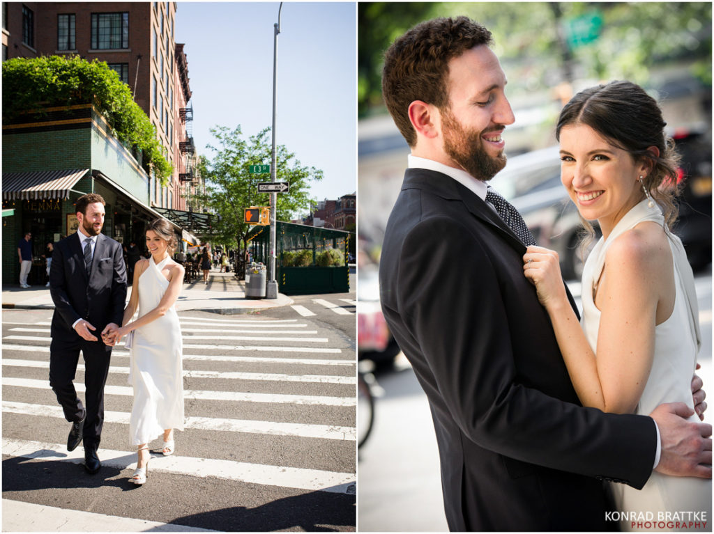 A bride and groom are walking down the street in front of the Bowery Hotel on their wedding day.