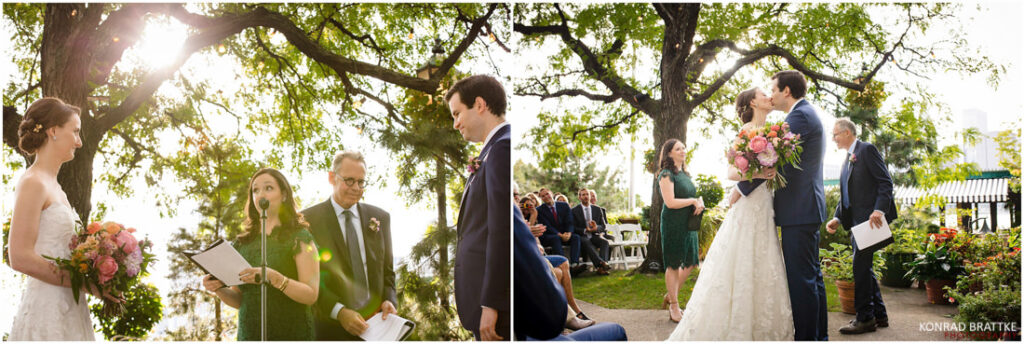 A bride and groom exchange vows in front of a tree at the River Cafe.