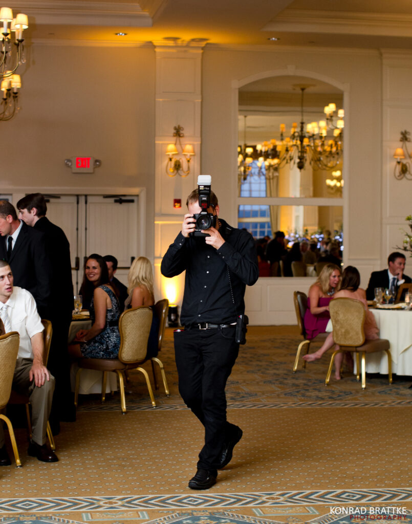 A Maryland wedding photographer capturing a memorable moment by taking a picture.