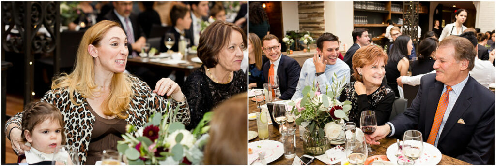 A group of people sitting at a table at a wedding.