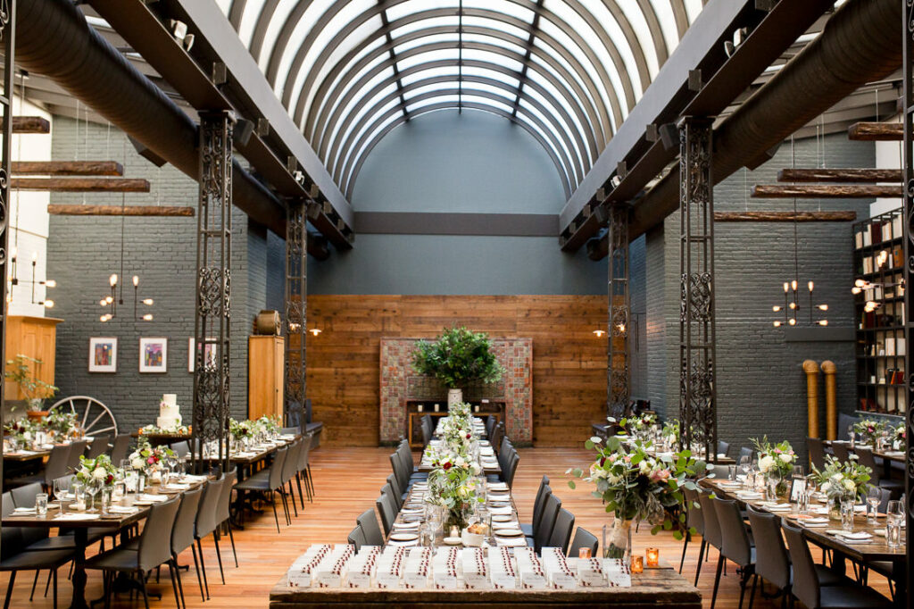 A wedding reception set up at The Milling Room with tables and chairs.