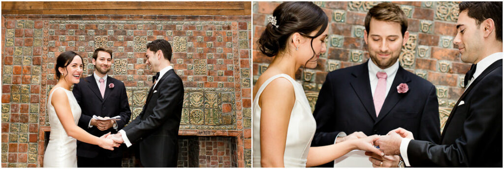 A bride and groom exchange their wedding rings in front of a brick wall.