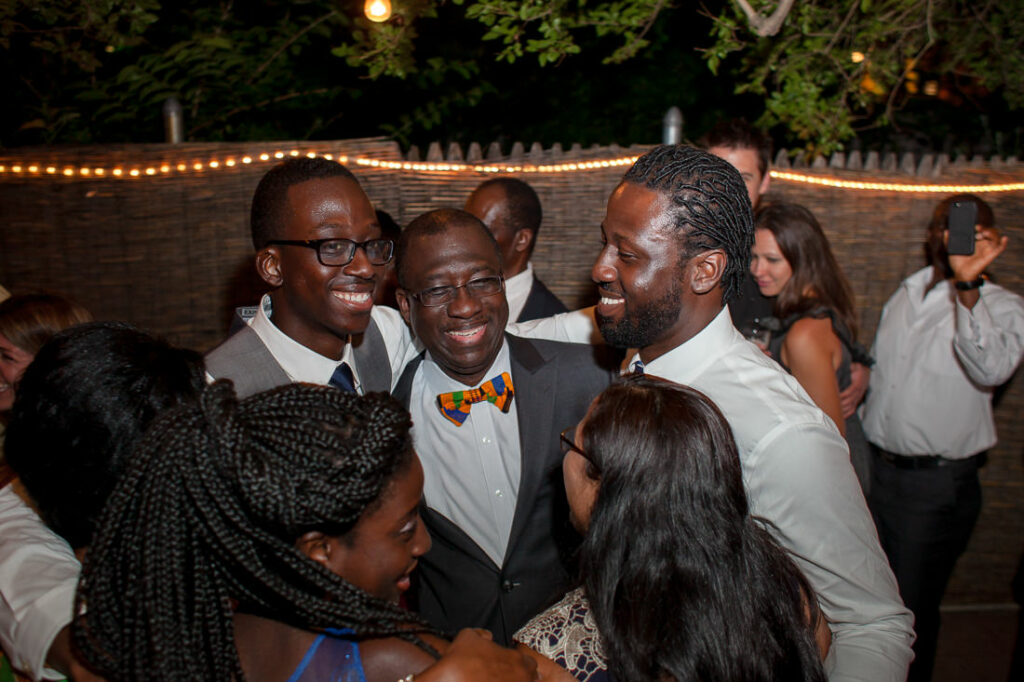 A group of people at Bacchus Bistro party.
