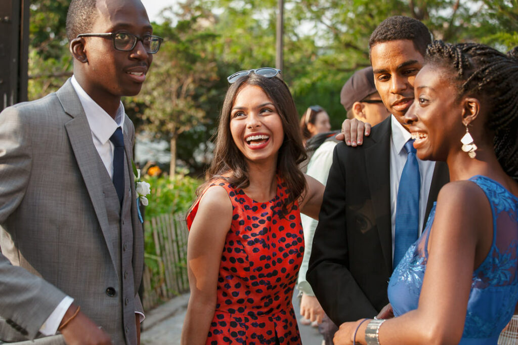 Guests at the Bacchus Bistro laughing at a formal event.