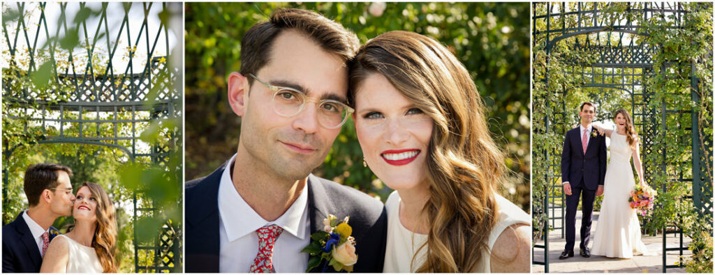 A bride and groom are posing in front of the New York Botanical Garden.