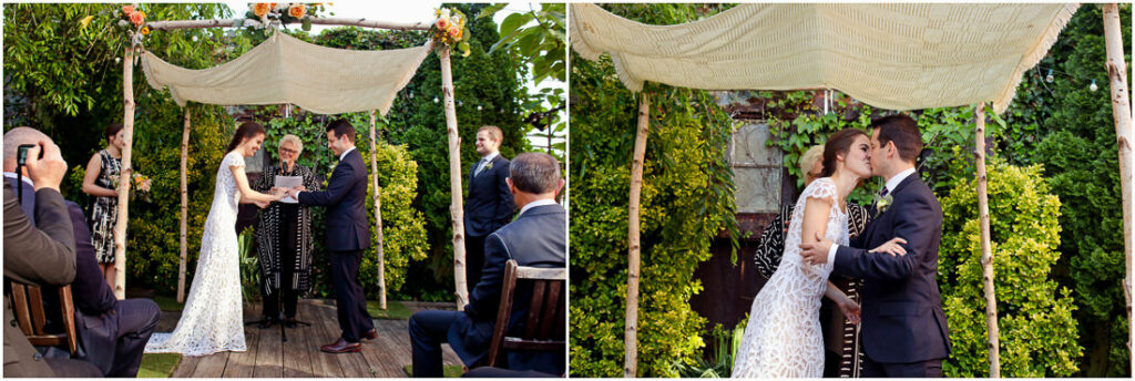 A bride and groom kissing under a romantic tent for their special day.