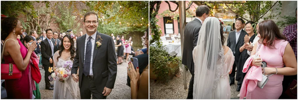 A bride and groom walk down the aisle at a wedding.