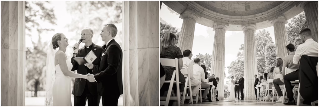 A couple stands holding hands during their wedding ceremony, officiated under a round outdoor pavilion, with guests seated on white chairs.