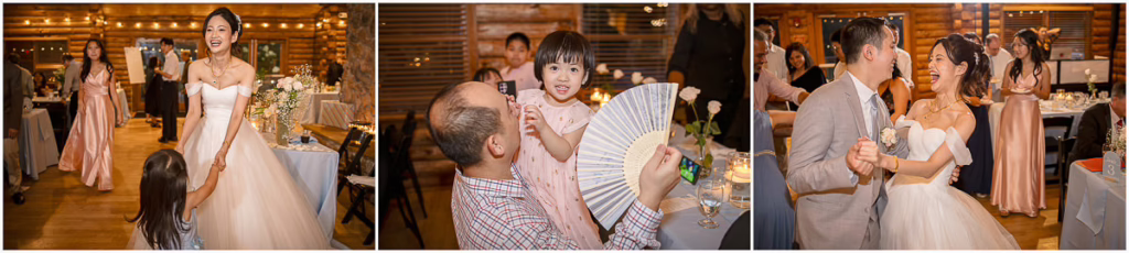 A bride in a white dress interacts with guests, including a child holding a fan, and dances with a man at a wedding reception indoors.